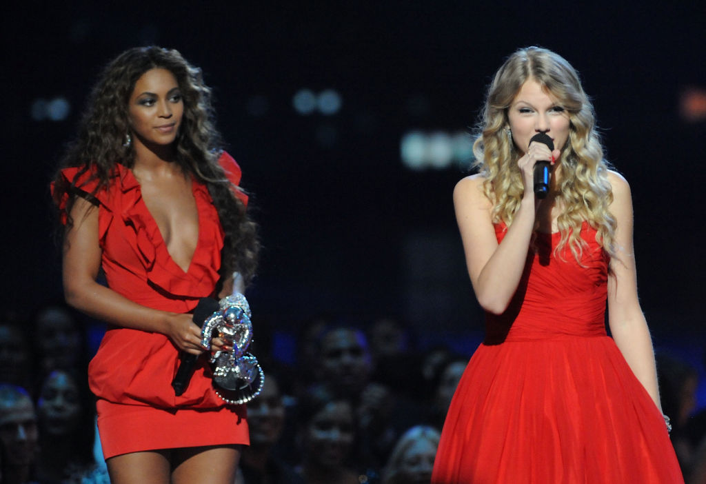 Taylor Swift speaks after Beyoncé allowed her to finish her speech after Beyoncé won "Best Video of the Year" onstage during the 2009 MTV Video Music Awards