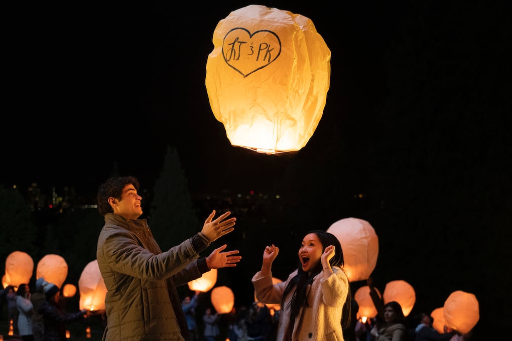 Peter Kavinsky (Noah Centineo) and Lara Jean (Lana Condor) light lanterns in 'To All The Boys: P.S. I Still Love You.' 