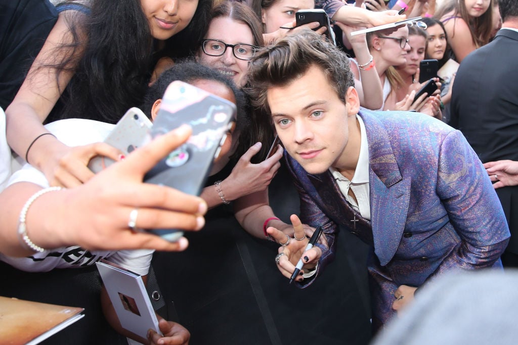 Harry Styles greets fans