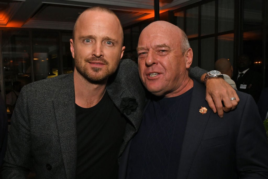 Aaron Paul and Dean Norris smiling at the camera