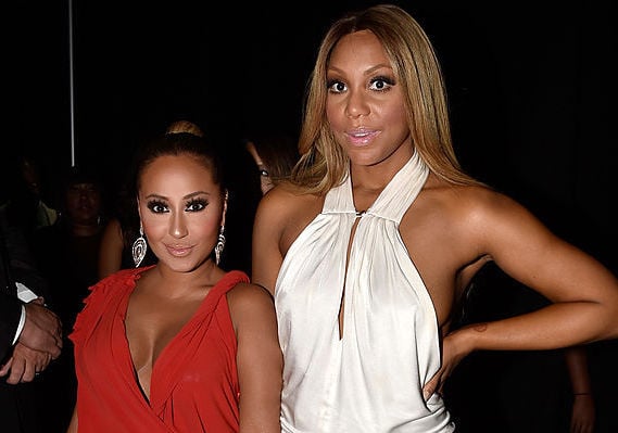 Adrienne Bailon and Tamar Braxton at an award show in June 2014