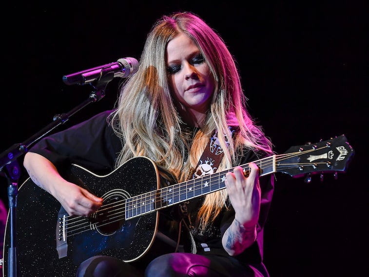 Avril Lavigne performs onstage