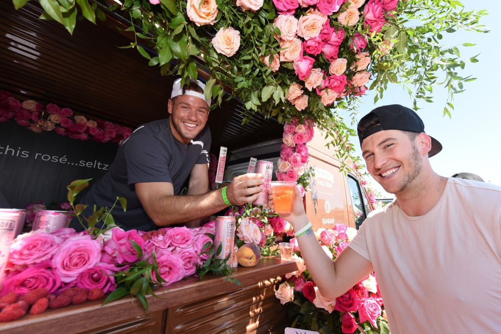Colton Underwood with Blake Horstmann enjoying a Smirnoff Seltzer’s Raspberry Rosè at Fizz Fight Festival