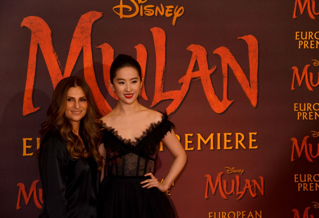 Niki Caro and Yifei Liu attend the "Mulan" photocall