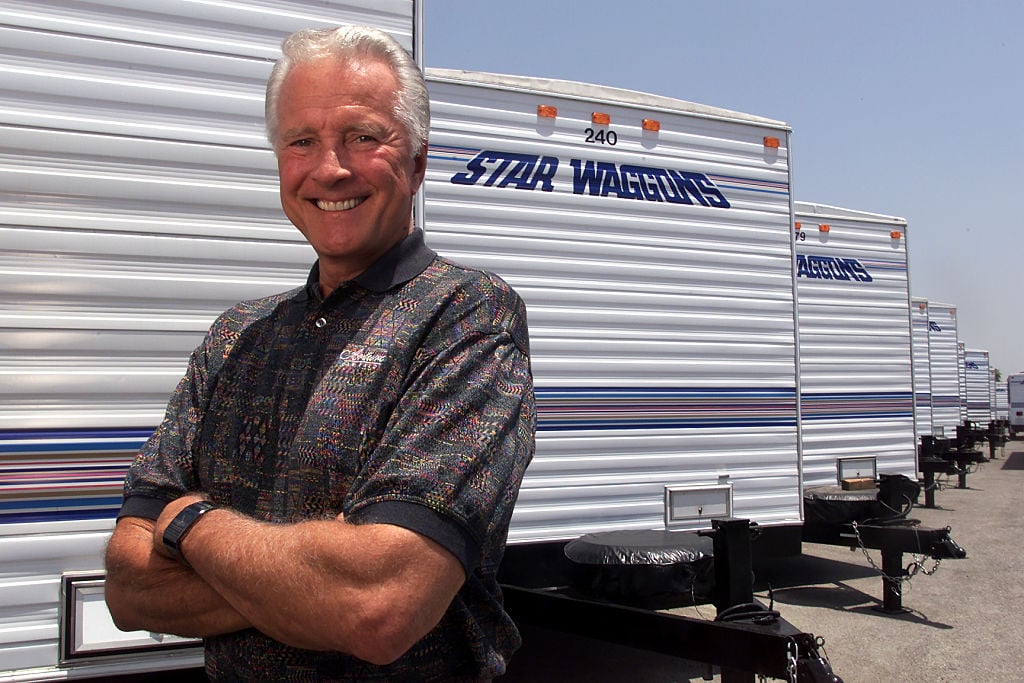 Lyle Waggoner standing with one of his Star Waggons 