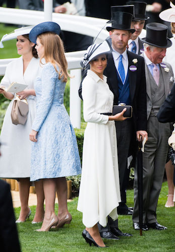 Prince Harry and Meghan Markle face away from Princess Beatrice and Princess Eugenie