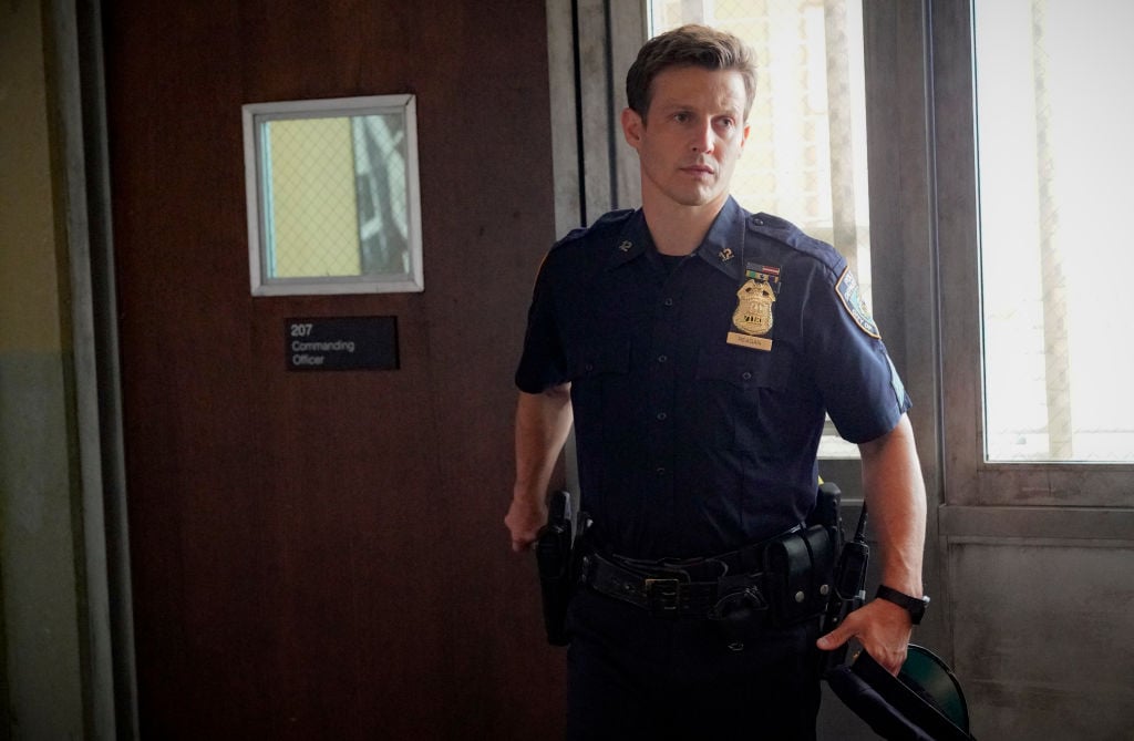 Will Estes as Jamie Reagan in police uniform