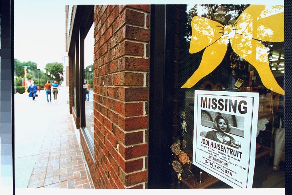 Storefront window with Jodi Huisentruit missing poster