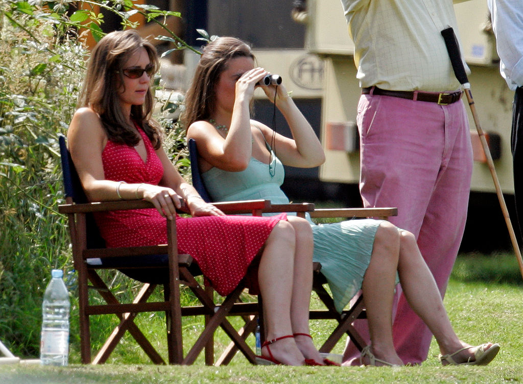Kate Middleton and Pippa Middleton watch Prince William play in a charity polo match on June 17, 2006
