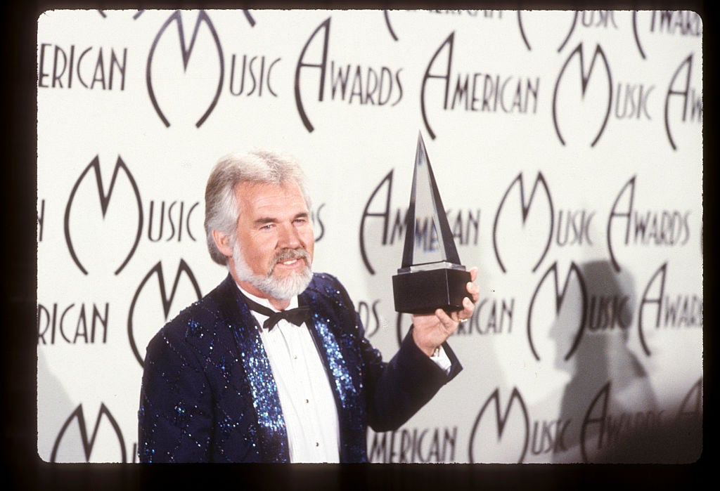 Kenny Rogers in 1985 at the American Music Awards | Walt Disney Television via Getty Images Photo Archives/Walt Disney Television via Getty Images