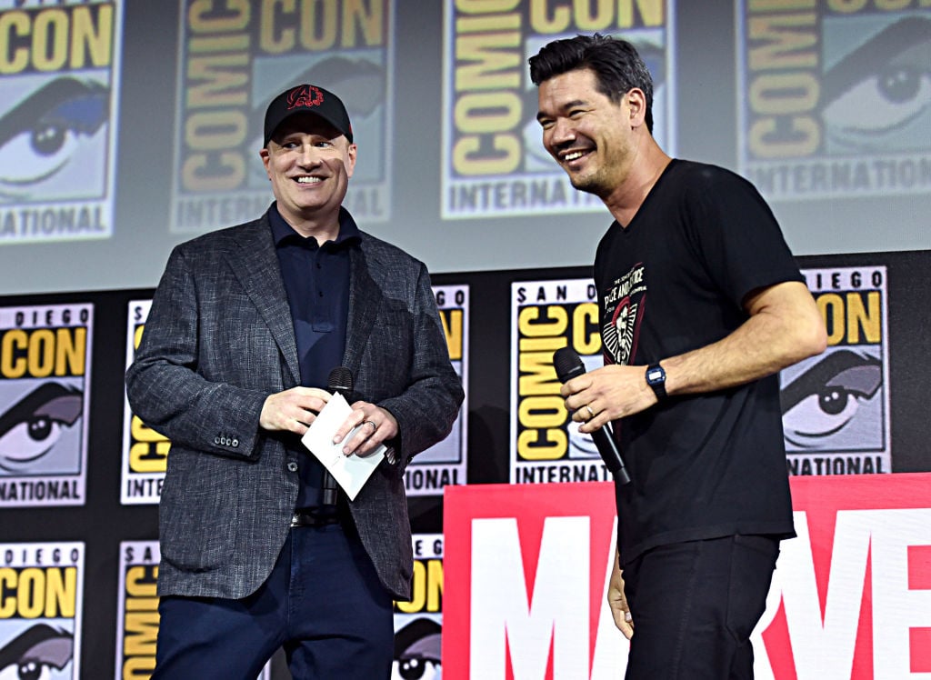 Kevin Feige and Destin Daniel smiling on stage