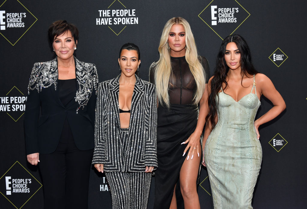Kris Jenner, Kourtney Kardashian, Khloé Kardashian, and Kim Kardashian West on the red carpet at an award show in November 2019
