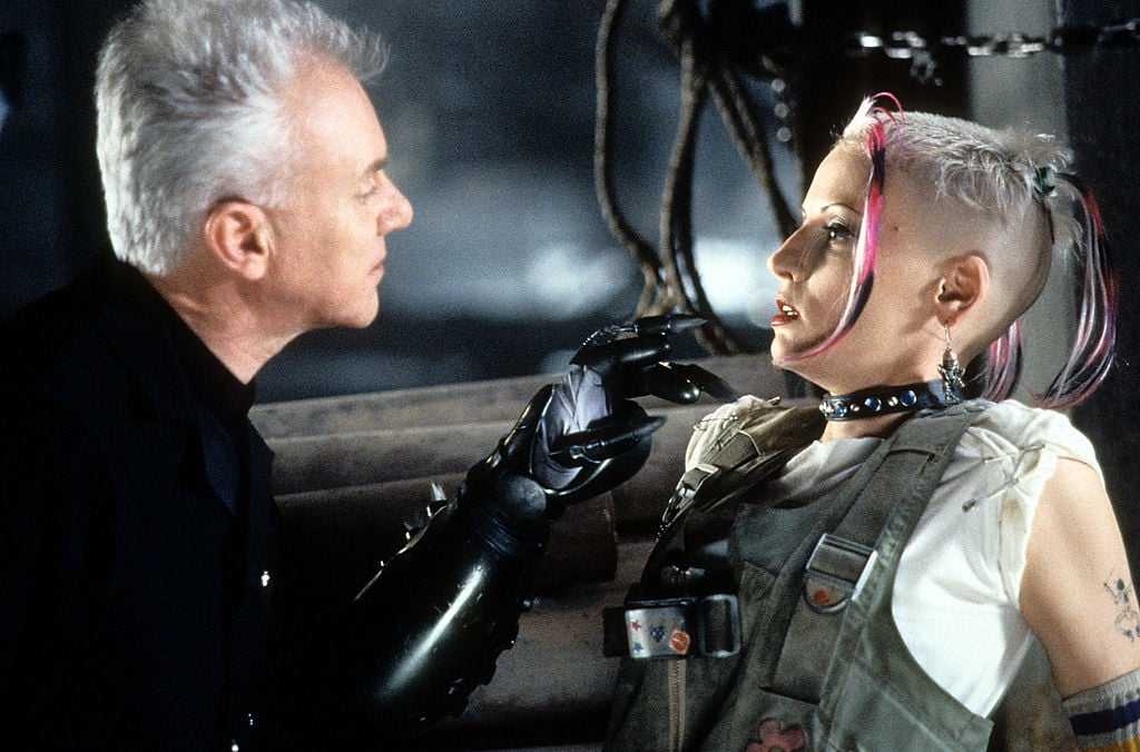 Lori Petty and Malcolm McDowell