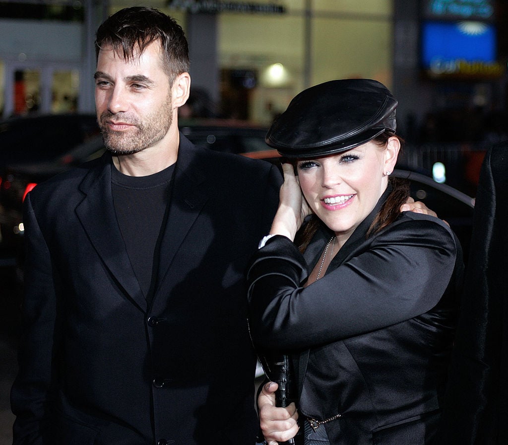 Dixie Chicks singer and actress Natalie Maines and her husband Adrian Pasdar pose for photographers