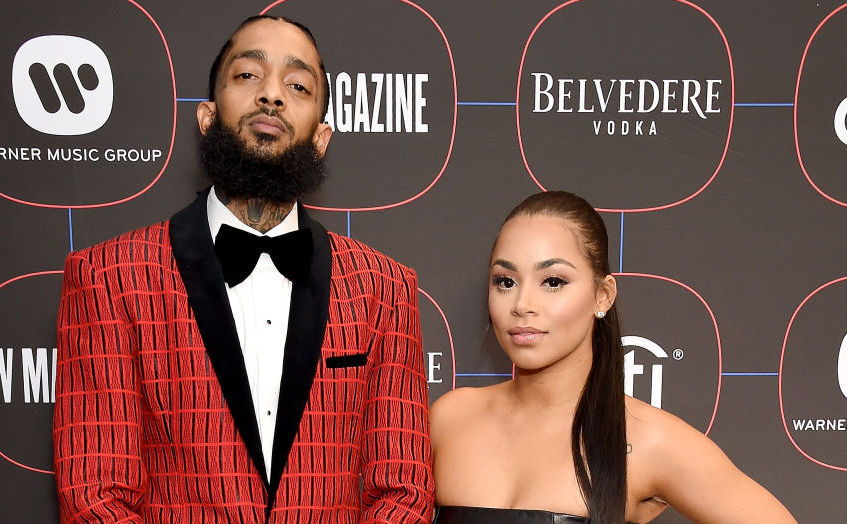 Nipsey Hussle and Lauren London on the red carpet at an event in February 2019