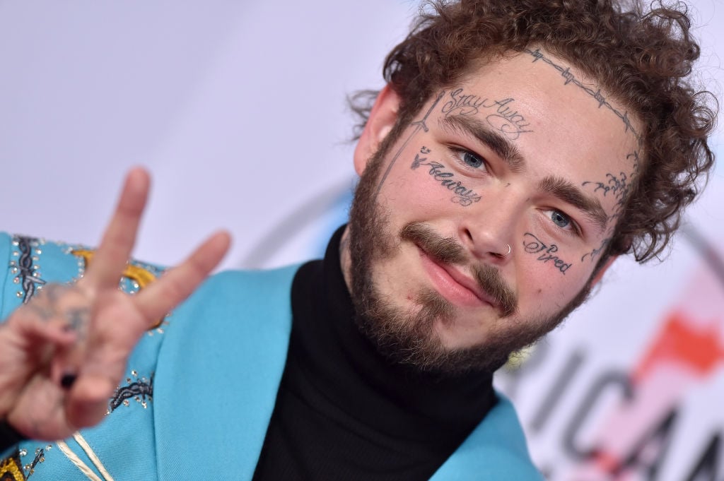 Post Malone giving a peace sign