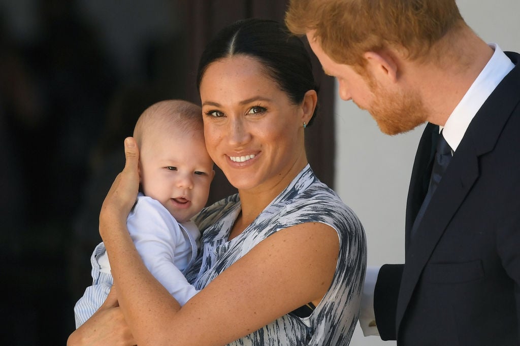 Prince Harry and Meghan Markle and their baby son Archie Mountbatten-Windsor at a meeting with Archbishop Desmond Tutu