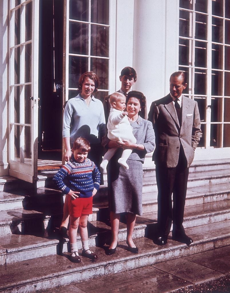 Queen Elizabeth II and Prince Philip with their children, Prince Charles, Princess Anne, Prince Andrew and little Prince Edward