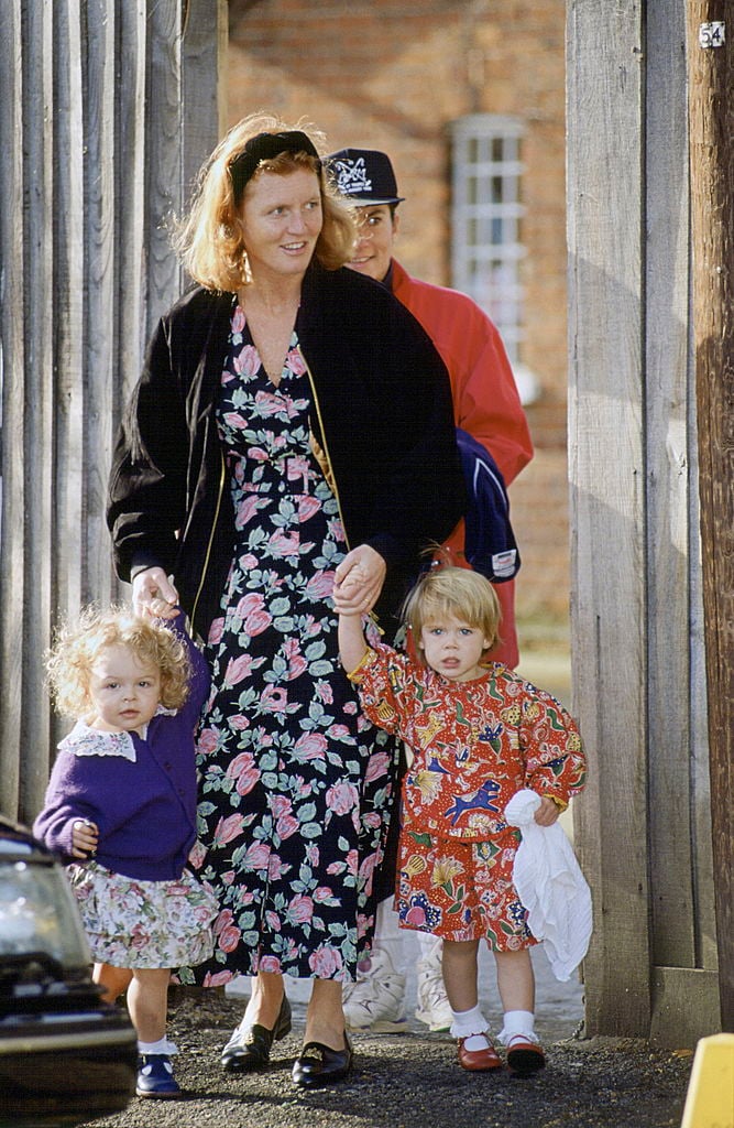 Sarah Ferguson, Princess Eugenie of York, and Zenouska Mowatt on Sept. 11, 1992