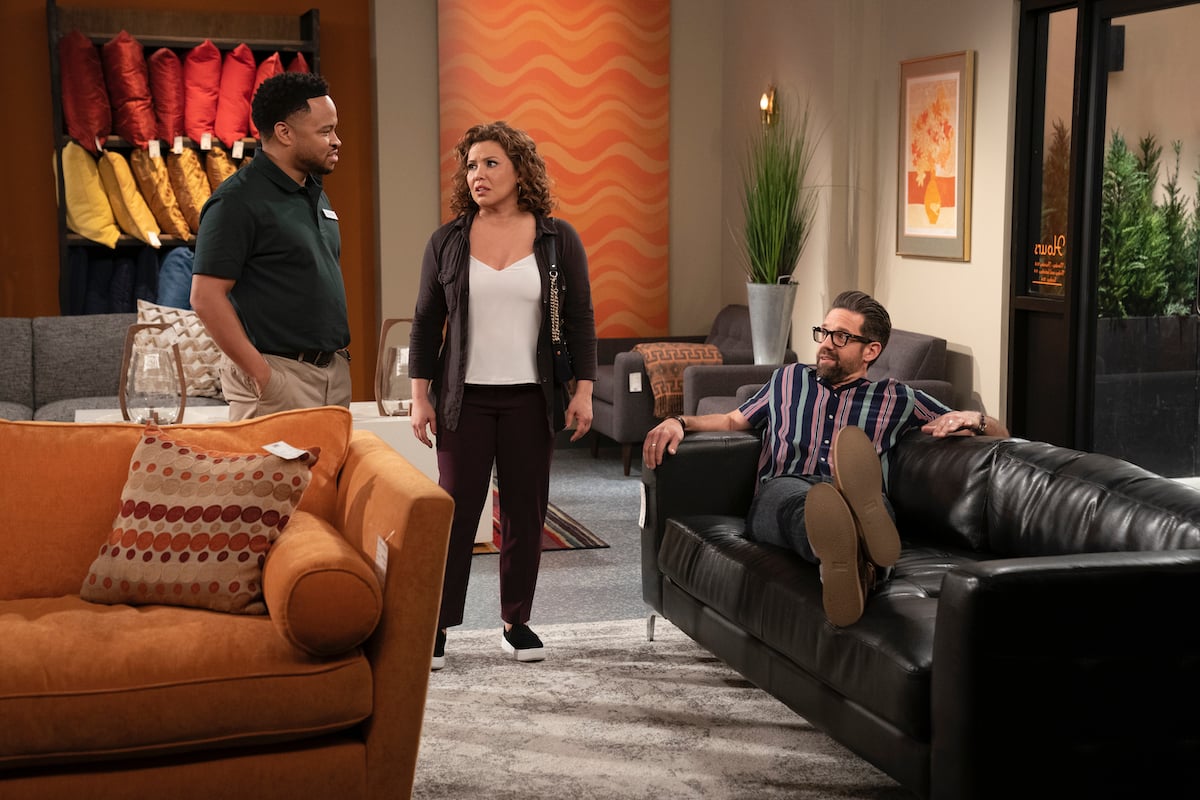 Eugene Byrd as the salesman, Justina Machado as Penelope and Todd Grinnell as Schneider in "Penny Pinching," 'ONE DAY AT A TIME.'