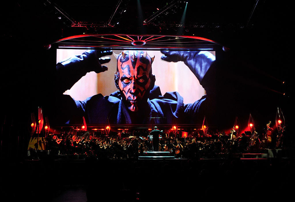 Ray Park as Darth Maul in 'Star Wars Episode I: The Phantom Menace,' shown on-screen while musicians perform during 'Star Wars: In Concert' at the Orleans Arena May 29, 2010 in Las Vegas, Nevada.