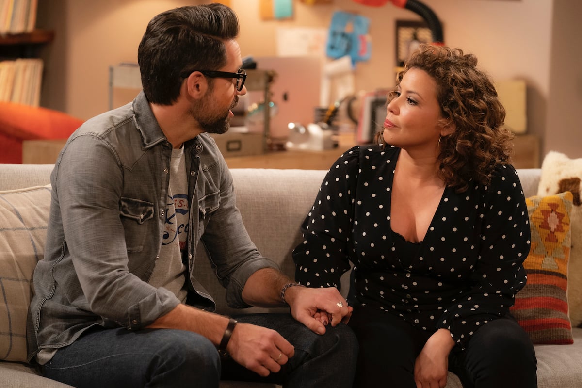 Todd Grinnell as Schneider and Justina Machado as Penelope in ONE DAY AT A TIME.