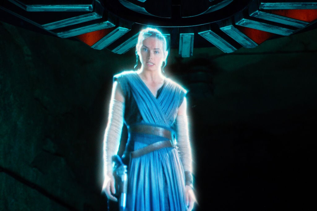 A hologram of Rey greets resistance fighters during Rise of the Resistance at Star Wars: Galaxy's Edge inside Disneyland in Anaheim, California.
