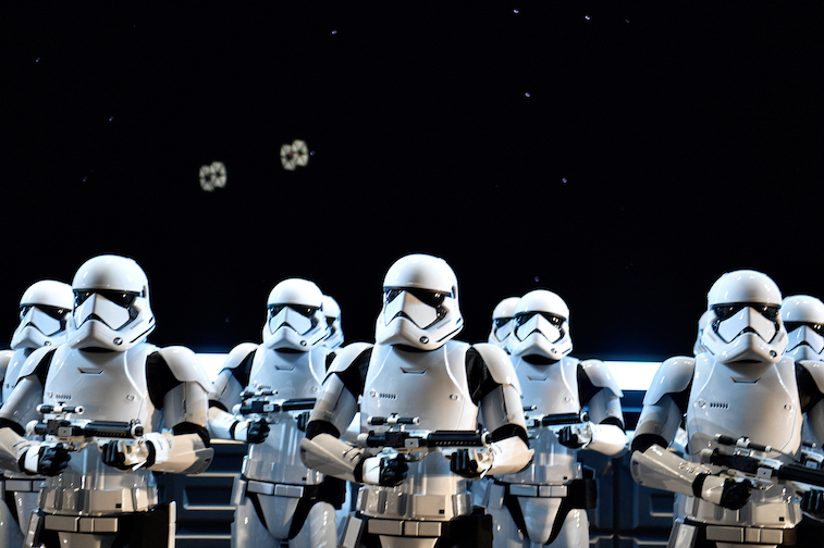 Stormtroopers stand guard on the flight deck of a Star Destroyer during Rise of the Resistance at Star Wars: Galaxy's Edge