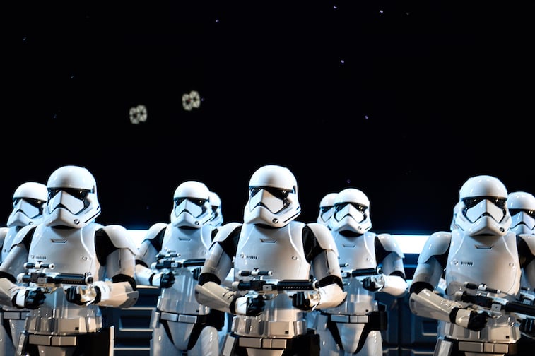 Stormtroopers stand guard on the flight deck of a Star Destroyer during Rise of the Resistance at Star Wars: Galaxy's Edge