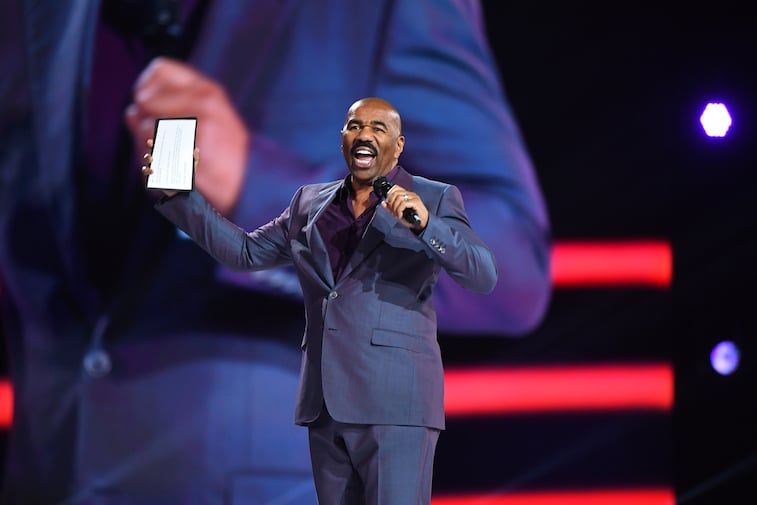 Steve Harvey speaks onstage