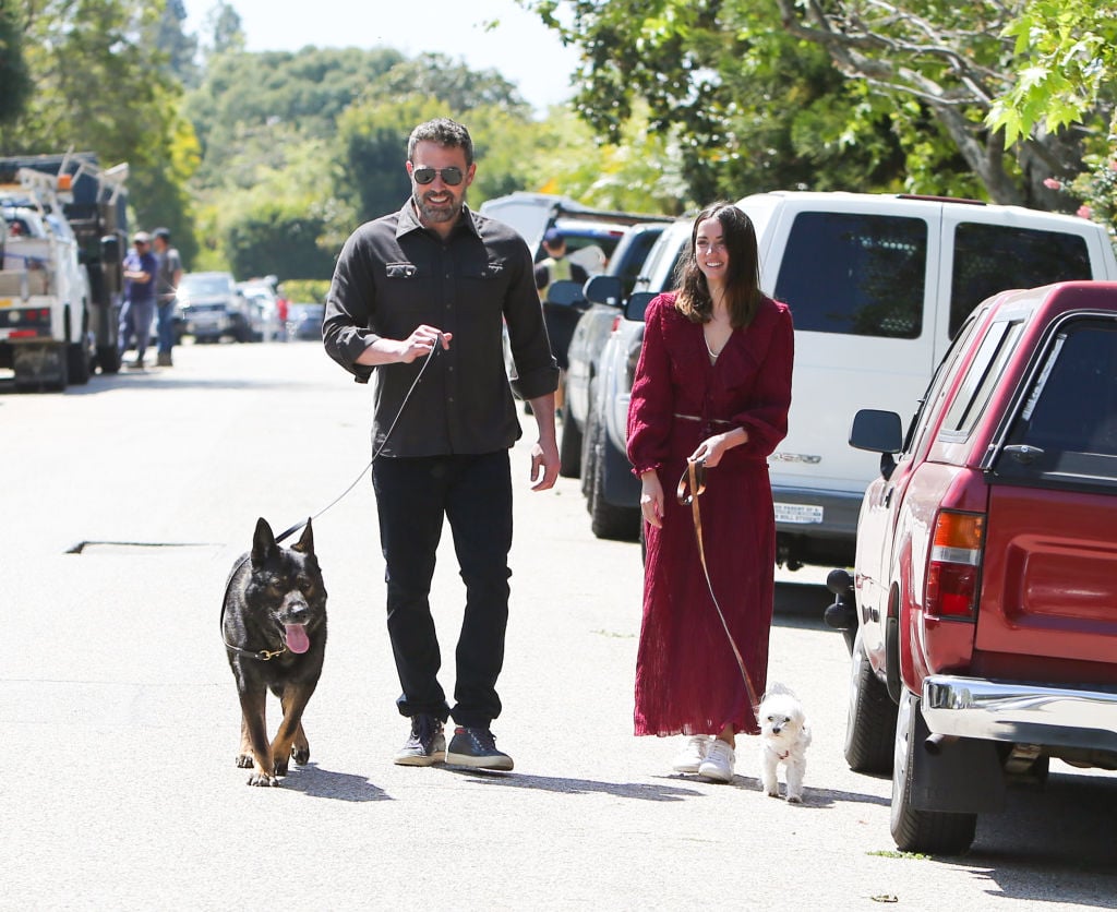Ben Affleck and Ana de Armas walking their dogs in the stree