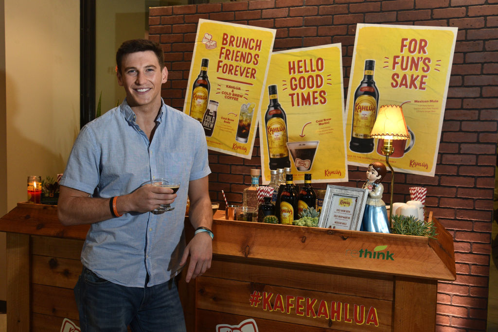 Blake Horstmann from 'The Bachelorette' holding a Cold Brew Martini at the Rethink Food's Cold Brew Cafe