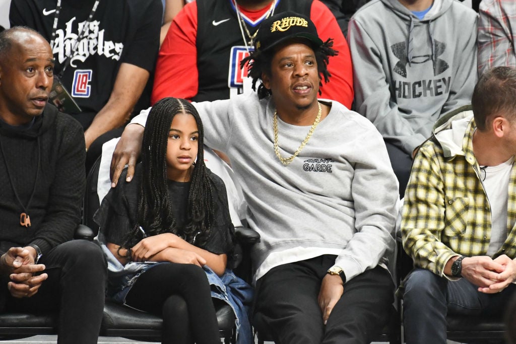 Blue Ivy Carter attend a basketball game