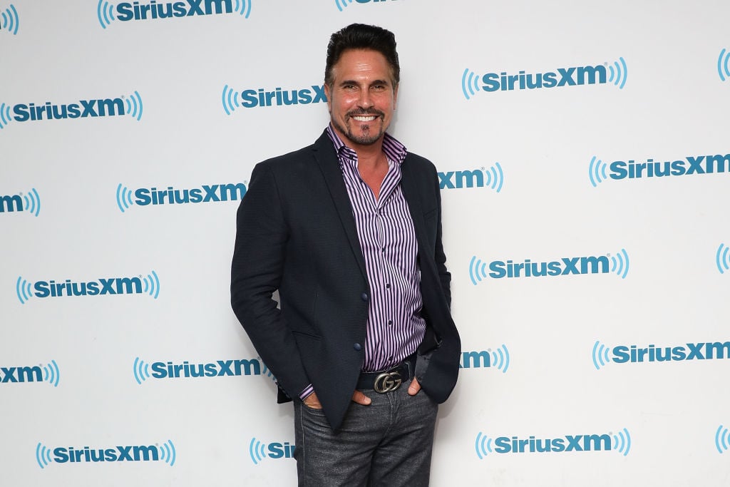 Don Diamont smiling in front of a repeating background