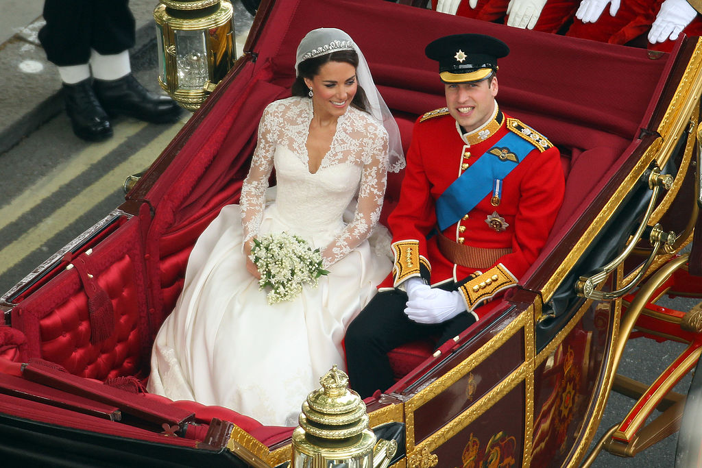 Kate Middleton and Prince William during carriage procession following 2011 royal wedding