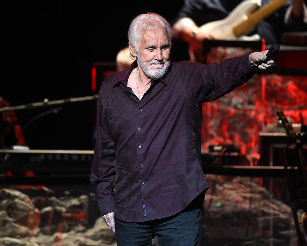 Kenny Rogers performs onstage during his final world tour | Kevin Winter/Getty Images