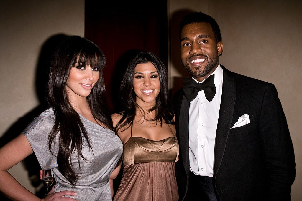 Kim Kardashian West, Kourtney Kardashian, and Kanye West in 2008