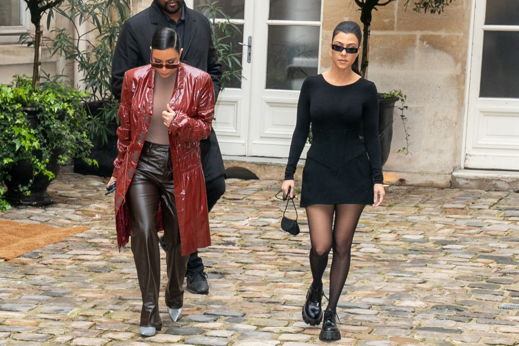 Kim Kardashian West and Kourtney Kardashian leave a pop-up fashion event on March 02, 2020 in Paris, France