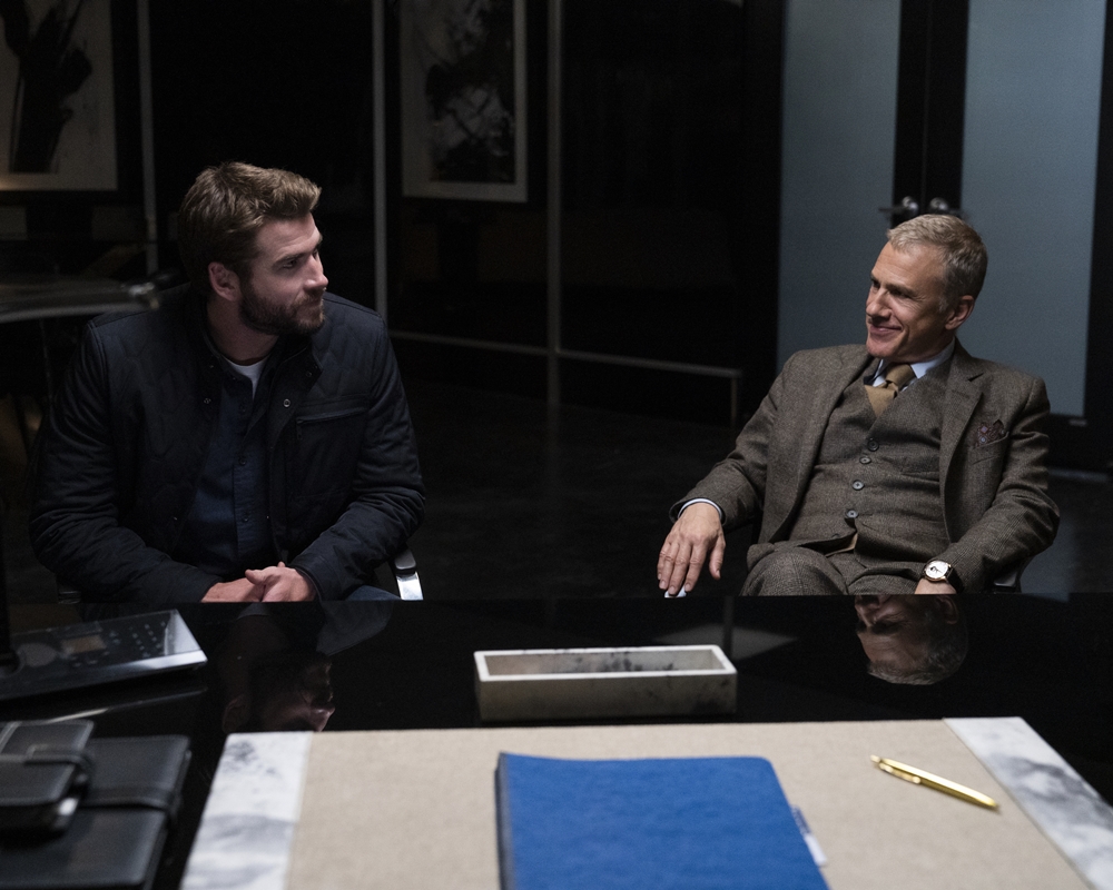 Liam Hemsworth and Christoph Waltz 