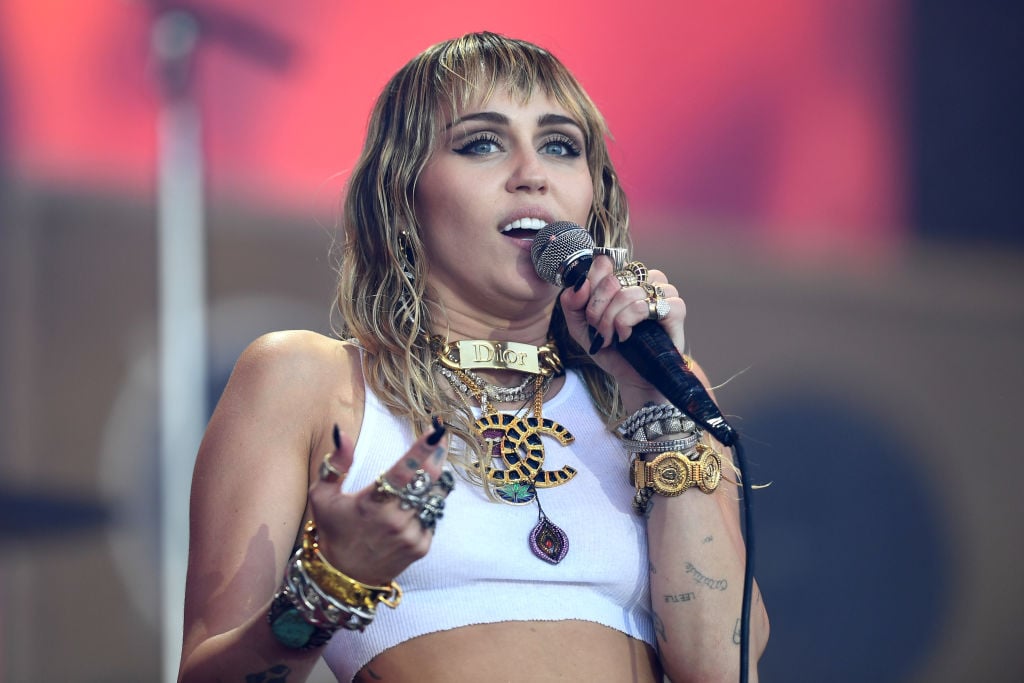 Miley Cyrus onstage at a festival in June 2019 in Glastonbury, England