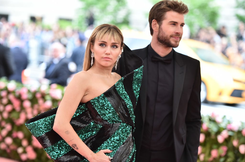 Miley Cyrus and Liam Hemsworth attend The 2019 Met Gala Celebrating Camp: Notes on Fashion