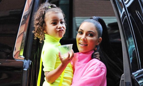 North West and Kim Kardashian West outside in September 2018