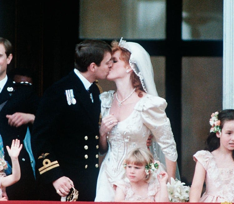 Prince Andrew kissing Sarah Ferguson on balcony