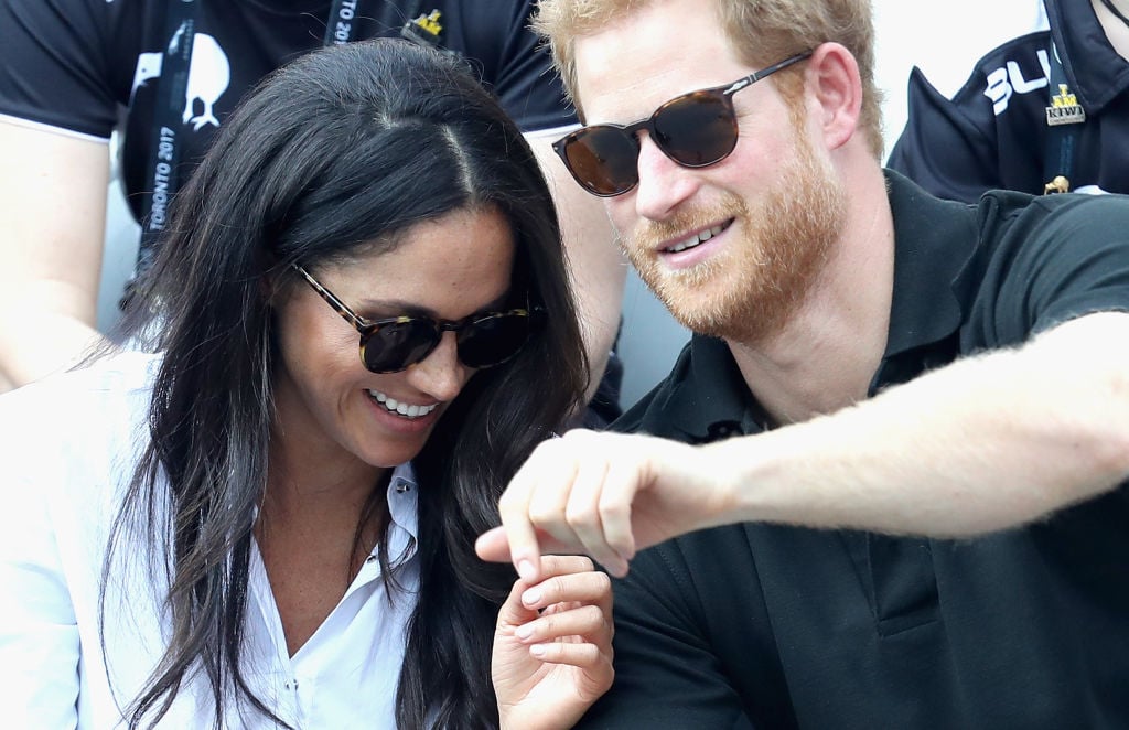 Prince Harry Meghan Markle hold hands