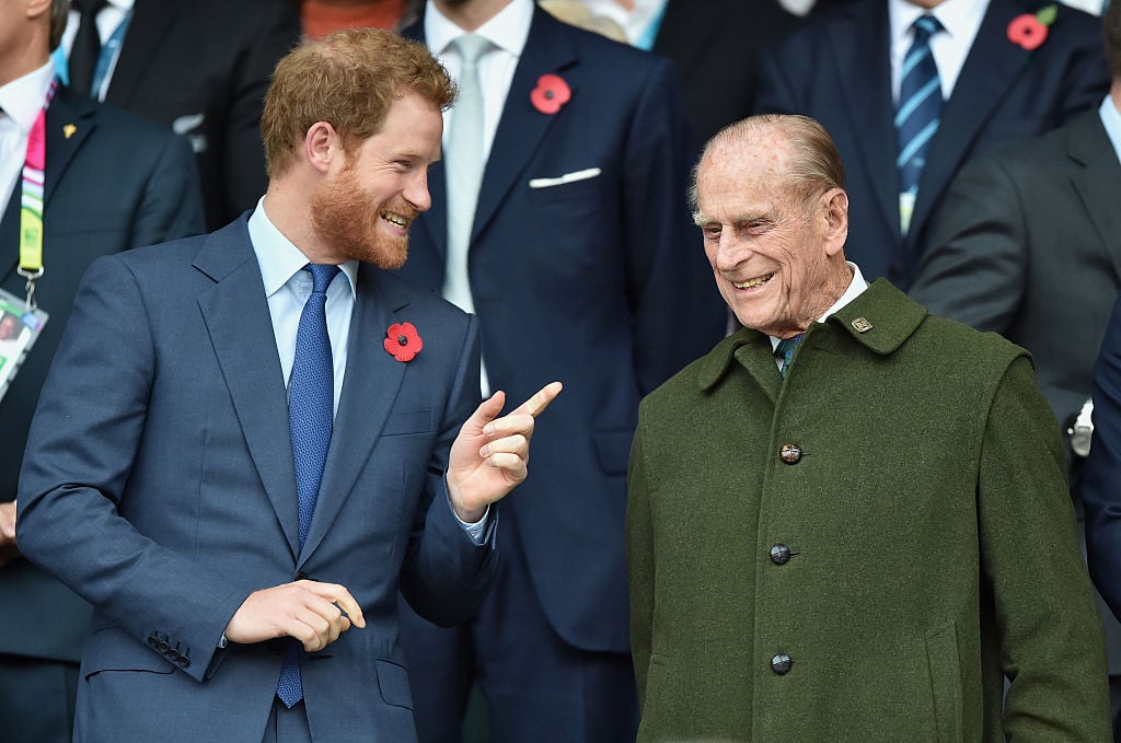 Prince Harry and Prince Philip, Duke of Edinburgh attend the 2015 Rugby World Cup Final match between New Zealand and Australia at Twickenham Stadium on October 31, 2015 in London, England