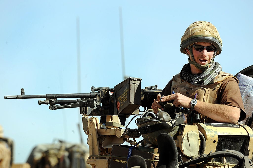 Prince Harry sits in an armored car