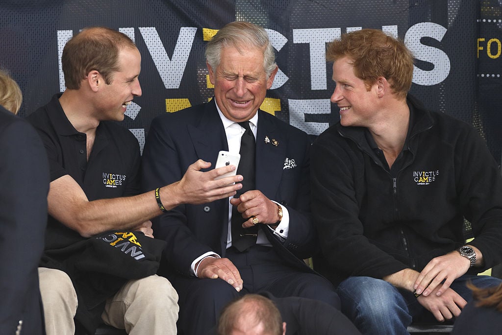 Prince William, Prince Charles, and Prince Harry at the Invictus Games in 2014