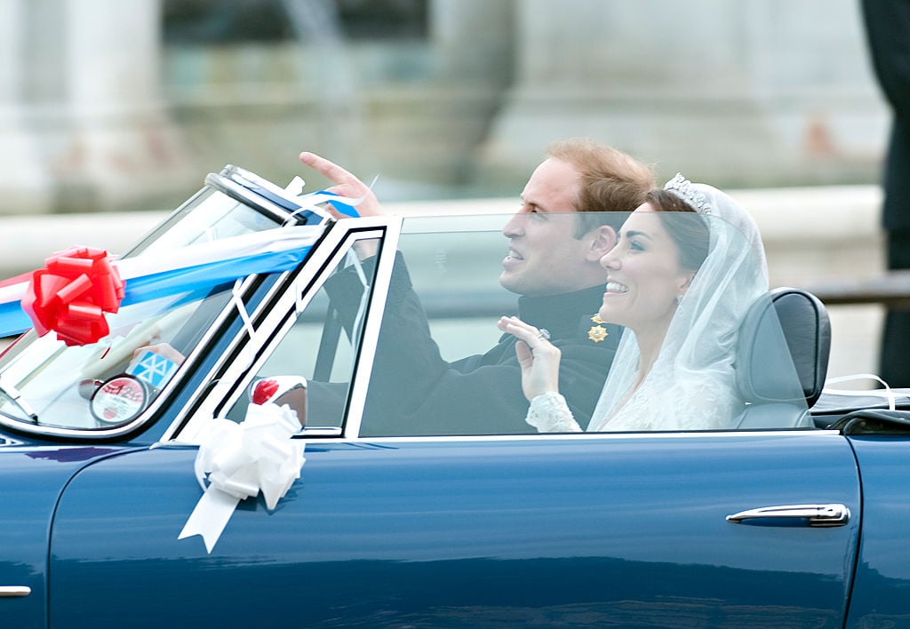 Prince William and Kate Middleton leave Buckingham Palace in a convertible