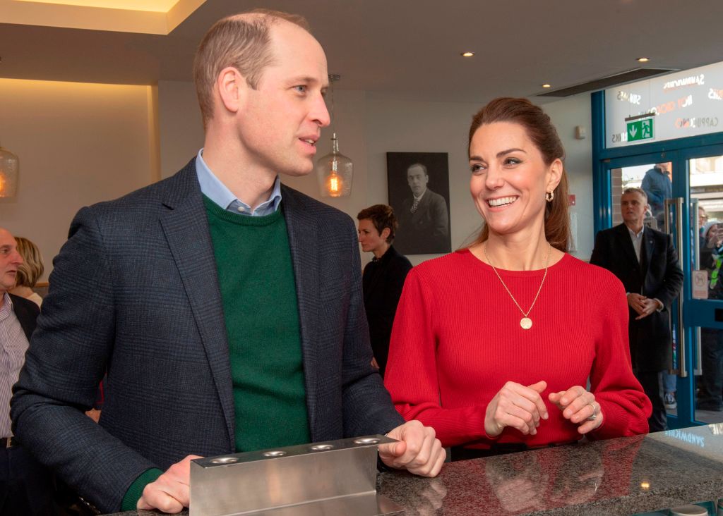 Prince William and Catherine, Duchess of Cambridge chat at the counter, during their visit to Joe's Ice Cream Parlour in Mumbles