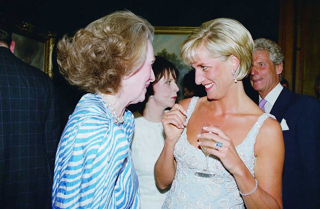 Diana, Princess of Wales at a private viewing and reception at Christies in aid of the Aid Crisis Trust and The Royal Marsden Hospital Cancer Fund, Diana is with her step-mother Raine, Comtesse De Chambrun (formerly Countess Raine Spencer), Diana is wearing a dress by Catherine Walker